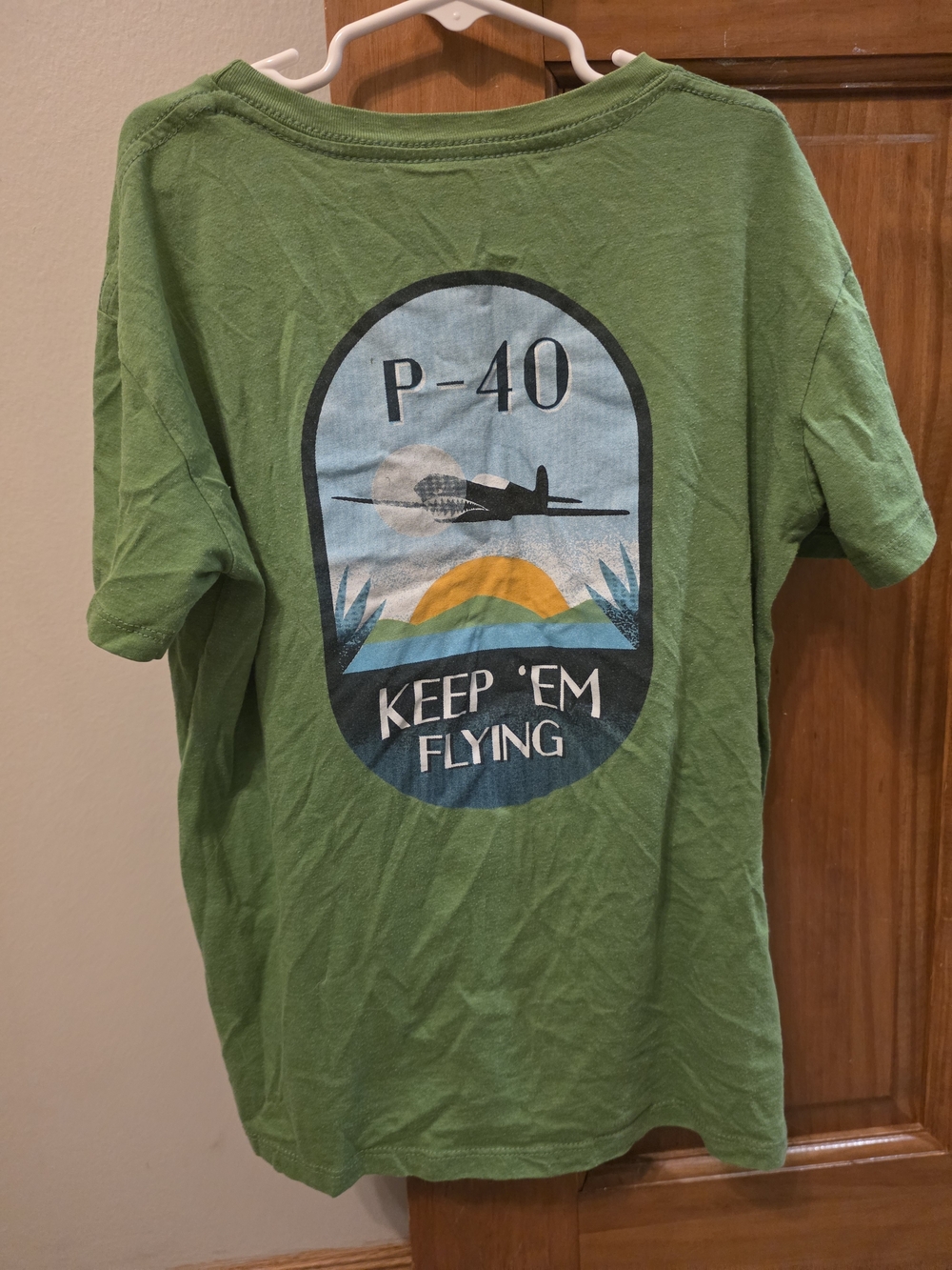 Pearl Harbor Green Kids Tee with P-40 'Keep 'Em Flying' Airplane Graphic